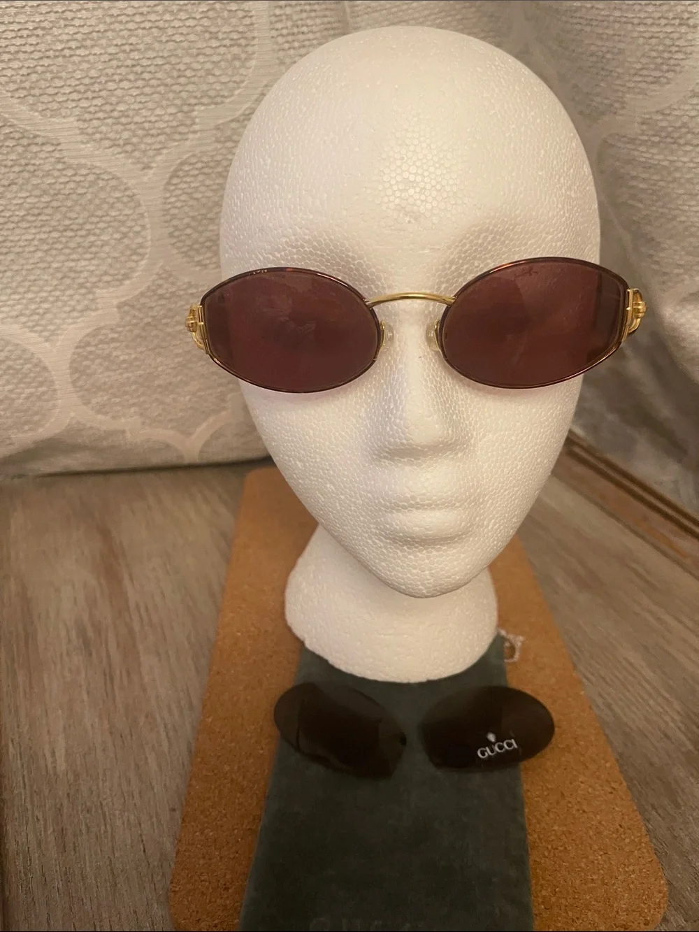 Gucci Oval Gold Frame Sunglasses with Brown Lenses